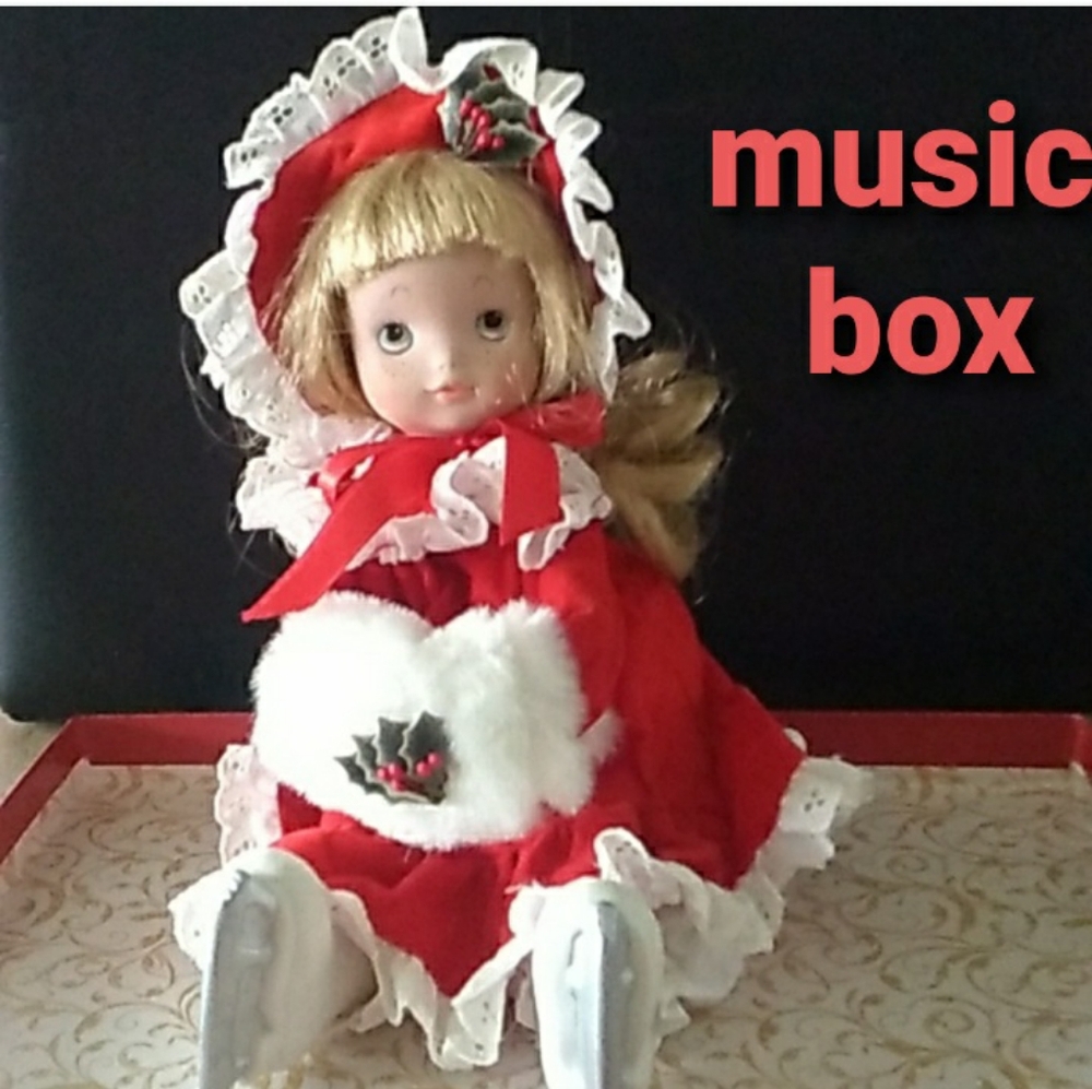 Vintage House of Lloyd's "Santa's Little Skater" Music Box Porcelain Doll